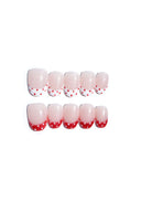 Set of nail art designs with red and white polka dots (press-on nails)