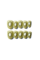 Kiwi slices press-on nails arranged in two rows on a white background
