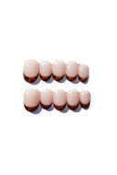 Set of pink and brown gradient grill press-on nails on a white background